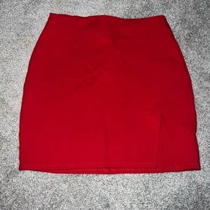 Red mini skirt with slit. Size: M